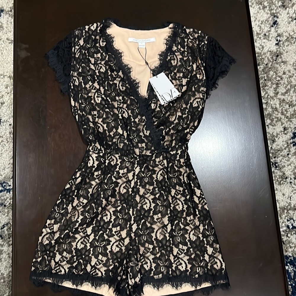 Diane von Furstenberg
Black and Tan Lace Romper/Jumpsuit